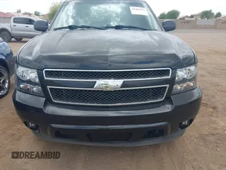 2007 Chevrolet Tahoe LS with VIN 1GNFC13C07J400472, listed as a IAAI auction lot 42209311 with 212,924 mi miles and . Bid and sale history available at DreamBid. Image 6.