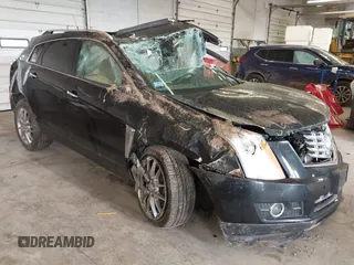 2014 Cadillac SRX Premium Collection with VIN 3GYFNGE35ES636852, listed as a IAAI auction lot 42283604 with 167,983 mi miles and . Bid and sale history available at DreamBid. Image 1.
