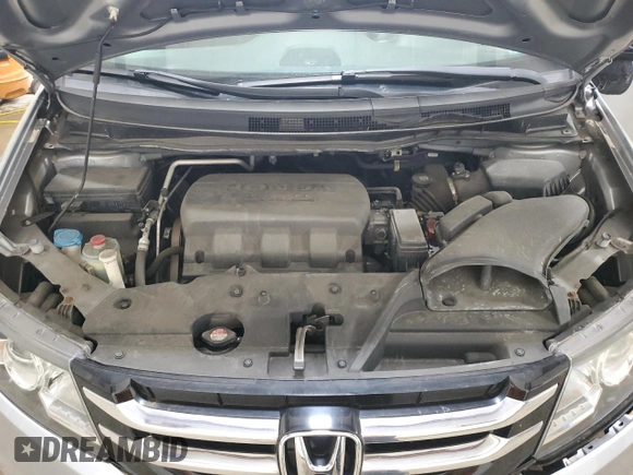 2016 Honda Odyssey SE with VIN 5FNRL5H31GB109718, listed as a Copart auction lot 54689915 with 48,933 mi miles and Salvage Title. Bid and sale history available at DreamBid. Image 12.
