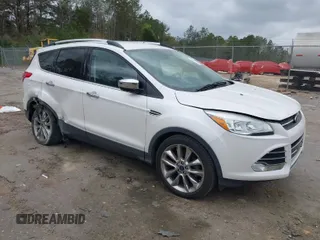 2016 Ford Escape SE with VIN 1FMCU0GX0GUA95789, listed as a IAAI auction lot 41829818 with 84,431 mi miles. Bid and sale history available at carsss.com. Image 1.