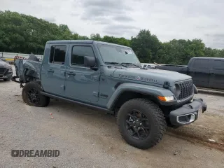 2024 Jeep Gladiator Sport S with VIN 1C6HJTAG2RL125730, listed as a Copart auction lot 60064095 with 10,173 mi miles and Salvage title. Bid and sale history available at DreamBid. Image 4.