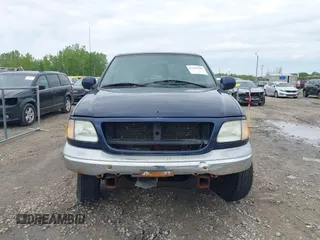 2003 Ford F-150 XLT with VIN 1FTRW08L63KD55851, listed as a IAAI auction lot 42359388 with Not provided miles and . Bid and sale history available at DreamBid. Image 12.