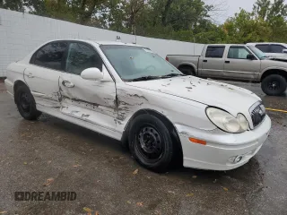 2003 Hyundai Sonata with VIN KMHWF25H43A771557, listed as a Copart auction lot 72527814 with 155,558 mi miles and Salvage Title. Bid and sale history available at carsss.com. Image 4.