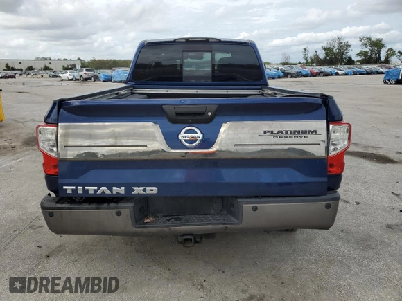 2016 Nissan Titan XD Platinum Reserve with VIN 1N6BA1F25GN503098, listed as a Copart auction lot 79867324 with 92,467 mi miles and Salvage Title. Bid and sale history available at carsss.com. Image 6.