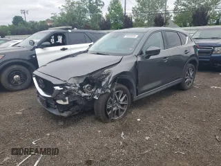 2018 Mazda CX-5 Grand Touring with VIN JM3KFBDM8J0424633, listed as a Copart auction lot 59888035 with 77,721 mi miles and Salvage title. Bid and sale history available at DreamBid. Image 1.