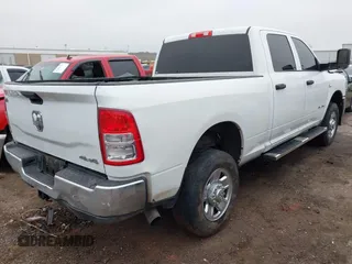 2021 Ram 2500 Tradesman with VIN 3C6UR5CLXMG632197, listed as a IAAI auction lot 41459787 with 105,906 mi miles. Bid and sale history available at carsss.com. Image 4.