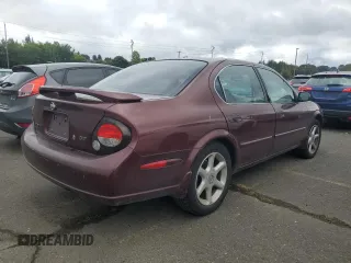 2001 Nissan Maxima GXE z VIN JN1CA31D91T831187, wystawiony jako Copart lot #72222434 z przebiegiem 138 438 mil mil oraz Szkoda całkowita • Salvage title. Historia ofert i sprzedaży dostępna na DreamBid. Obrazek 3.