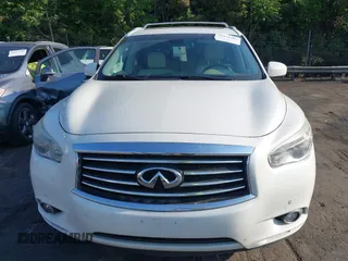 2015 Infiniti QX60 z VIN 5N1AL0MM8FC517929, wystawiony jako IAAI lot #42118295 z przebiegiem 104 188 mil mil oraz . Historia ofert i sprzedaży dostępna na DreamBid. Obrazek 12.