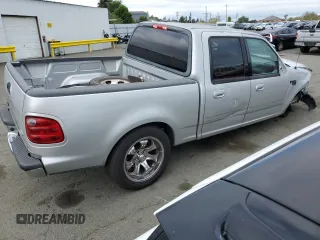 2002 Ford F-150 XLT with VIN 1FTRW07602KE38959, listed as a Copart auction lot 50547095 with 160,908 mi miles and Salvage Title. Bid and sale history available at carsss.com. Image 3.