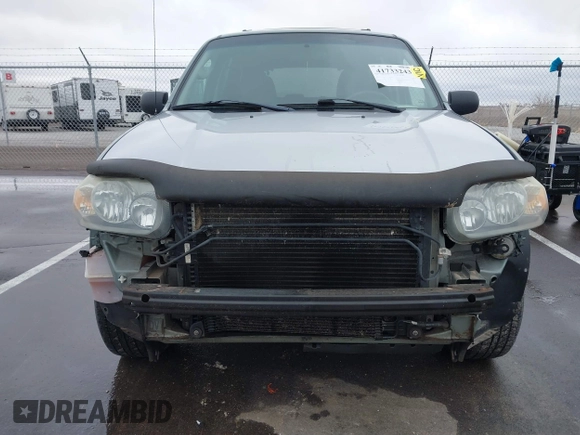 2006 Ford Escape XLT with VIN 1FMYU03126KC55897, listed as a IAAI auction lot 41733243 with 136,989 mi miles. Bid and sale history available at carsss.com. Image 6.