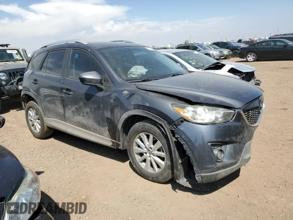 2014 Mazda CX-5 Sport z VIN JM3KE4BE1E0359446, wystawiony jako Copart lot #54562545 z przebiegiem 128 150 mil mil oraz Szkoda całkowita • Salvage title. Historia ofert i sprzedaży dostępna na DreamBid. Obrazek 4.