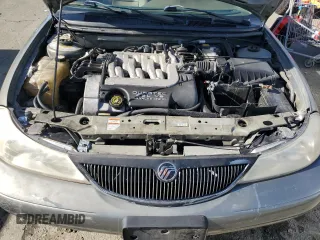 1999 Mercury Mystique с VIN 1MEFM66L5XK639295, выставлен на аукционе Copart как лот 43658735 с пробегом 130 522 миль миль и Списание • Salvage title. История ставок и продаж доступна на DreamBid. Изображение 11.