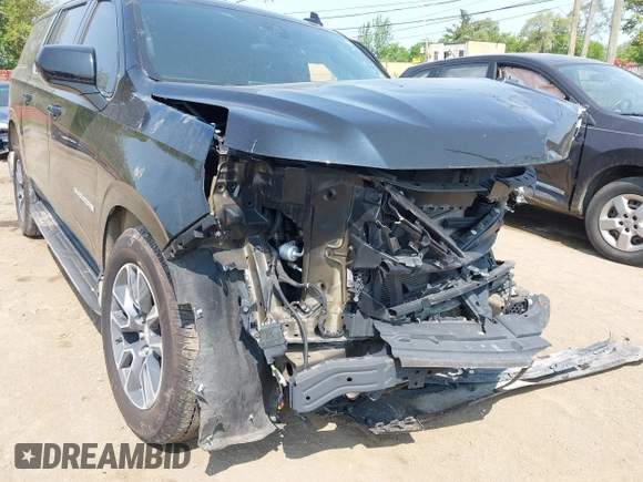2021 Chevrolet Suburban LS z VIN 1GNSKBKD5MR303640, wystawiony jako IAAI lot #42359585 z przebiegiem Nie podano mil oraz . Historia ofert i sprzedaży dostępna na DreamBid. Obrazek 17.