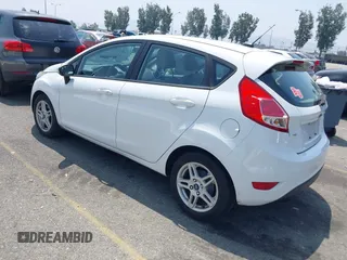 2018 Ford Fiesta SE z VIN 3FADP4EJ8JM141067, wystawiony jako IAAI lot #42417301 z przebiegiem 71 150 mil mil oraz . Historia ofert i sprzedaży dostępna na DreamBid. Obrazek 3.