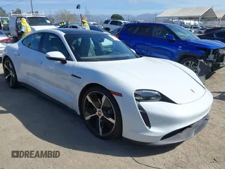 2021 Porsche Taycan 4S z VIN WP0AB2Y12MSA43873, wystawiony jako IAAI lot #41703233 z przebiegiem 24 452 mil mil oraz . Historia ofert i sprzedaży dostępna na DreamBid. Obrazek 1.