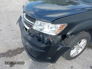 2013 Dodge Journey SE with VIN 3C4PDCAB0DT710609, listed as a IAAI auction lot 41763431 with 145,851 mi miles and . Bid and sale history available at DreamBid. Image 14.