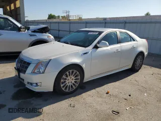 2011 Cadillac CTS Performance with VIN 1G6DL5EY2B0137452, listed as a Copart auction lot 61185105 with 80,001 mi miles and Salvage title. Bid and sale history available at DreamBid. Image 1.