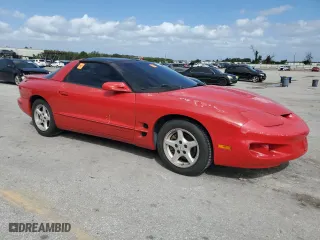 2001 Pontiac Firebird with VIN 2G2FS22K812122608, listed as a Copart auction lot 75337064 with 121,417 mi miles and Salvage Title. Bid and sale history available at carsss.com. Image 4.