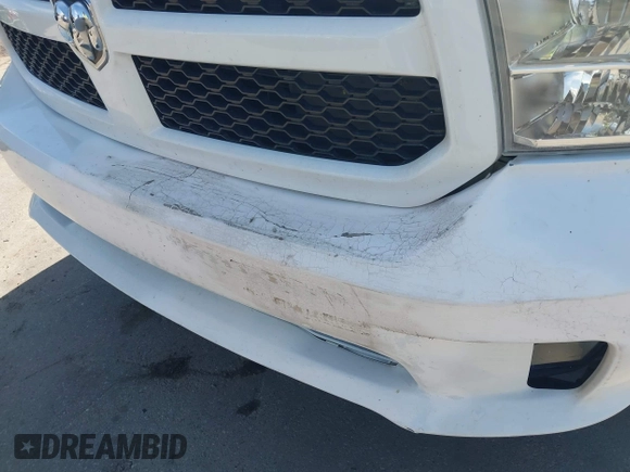 2014 Ram 1500 Tradesman z VIN 1C6RR6FG8ES455931, wystawiony jako IAAI lot #42317340 z przebiegiem 224 782 mil mil oraz . Historia ofert i sprzedaży dostępna na DreamBid. Obrazek 6.