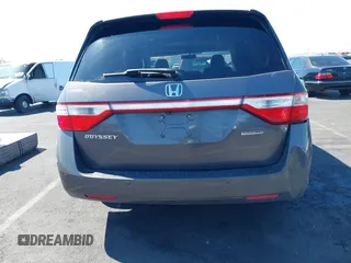 2013 Honda Odyssey Touring with VIN 5FNRL5H95DB045666, listed as a IAAI auction lot 42117219 with 50,715 mi miles and . Bid and sale history available at carsss.com. Image 16.