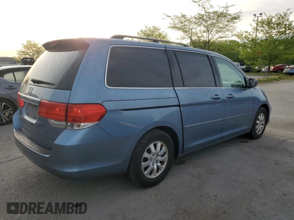 2009 Honda Odyssey EX-L with VIN 5FNRL38759B004710, listed as a Copart auction lot 54210425 with 171,674 mi miles and Salvage Title. Bid and sale history available at DreamBid. Image 3.