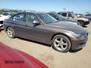 2014 BMW 3 Series 328i with VIN WBA3C1C54EK115517, listed as a Copart auction lot 52982655 with 63,203 mi miles and Salvage Title. Bid and sale history available at carsss.com. Image 4.