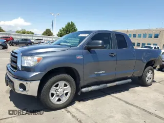 2010 Toyota Tundra with VIN 5TFUW5F14AX148898, listed as a Copart auction lot 63316765 with 79,983 mi miles and Salvage title. Bid and sale history available at DreamBid. Image 1.