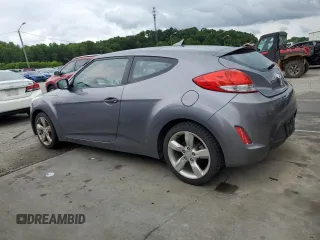 2013 Hyundai Veloster w/Red Int z VIN KMHTC6AD4DU088649, wystawiony jako Copart lot #58329295 z przebiegiem 174 798 mil mil oraz Czysty tytuł • Clean title. Historia ofert i sprzedaży dostępna na DreamBid. Obrazek 2.