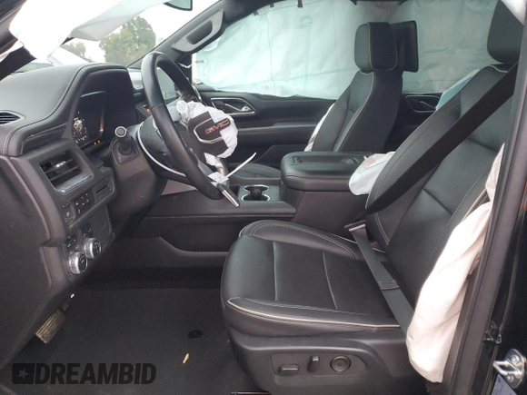 2023 GMC Yukon XL SLT with VIN 1GKS2GKD5PR363433, listed as a Copart auction lot 85979734 with 61,957 mi miles and Salvage Title. Bid and sale history available at DreamBid. Image 7.