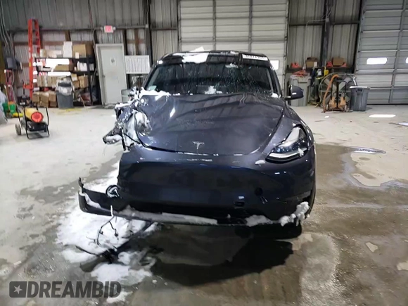 2023 Tesla Model Y Long Range z VIN 7SAYGAEE3PF968231, wystawiony jako Copart lot #45811385 z przebiegiem Nie podano mil oraz Szkoda całkowita • Salvage title. Historia ofert i sprzedaży dostępna na DreamBid. Obrazek 11.