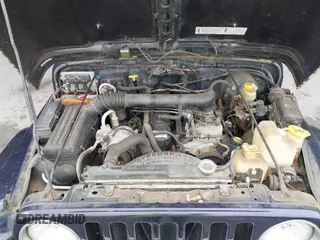 1999 Jeep Wrangler Sport with VIN 1J4FY19S1XP402974, listed as a IAAI auction lot 41659511 with 152,024 mi miles. Bid and sale history available at carsss.com. Image 10.