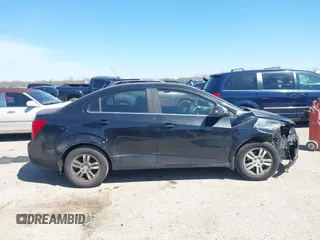 2014 Chevrolet Sonic LT with VIN 1G1JC5SH1E4243143, listed as a IAAI auction lot 41841260 with 170,514 mi miles and . Bid and sale history available at DreamBid. Image 13.