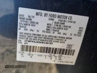 2019 Ford Edge SEL with VIN 2FMPK4J95KBC40185, listed as a Copart auction lot 43233055 with 102,951 mi miles and Salvage Title. Bid and sale history available at carsss.com. Image 13.