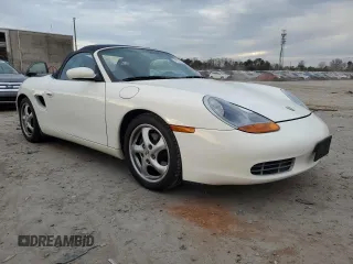 2000 Porsche Boxster z VIN WP0CA2980YU622861, wystawiony jako Copart lot #78993794 z przebiegiem 129 631 mil mil oraz Czysty tytuł • Clean title. Historia ofert i sprzedaży dostępna na DreamBid. Obrazek 4.