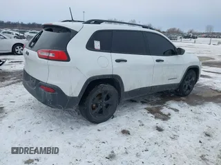 2016 Jeep Cherokee Altitude with VIN 1C4PJLAB4GW376723, listed as a IAAI auction lot 41593248 with 96,940 mi miles and . Bid and sale history available at DreamBid. Image 4.