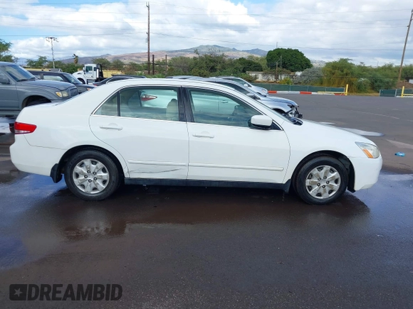 2004 Honda Accord LX with VIN JHMCM56344C005690, listed as a IAAI auction lot 41360785 with 132,915 mi miles and . Bid and sale history available at DreamBid. Image 13.