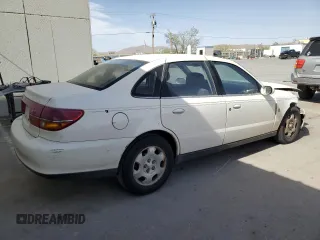 2002 Saturn LS z VIN 1G8JW54R72Y576434, wystawiony jako Copart lot #55029305 z przebiegiem 135 613 mil mil oraz Szkody całkowita. Historia ofert i sprzedaży dostępna na DreamBid. Obrazek 3.