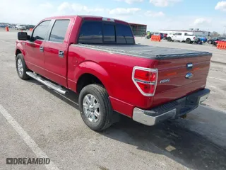 2013 Ford F-150 XL with VIN 1FTFW1CF1DKE27969, listed as a IAAI auction lot 41860397 with 194,938 mi miles. Bid and sale history available at carsss.com. Image 3.