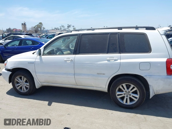 2006 Toyota Highlander z VIN JTEDW21A060015587, wystawiony jako IAAI lot #42239548 z przebiegiem 164 410 mil mil oraz . Historia ofert i sprzedaży dostępna na DreamBid. Obrazek 14.