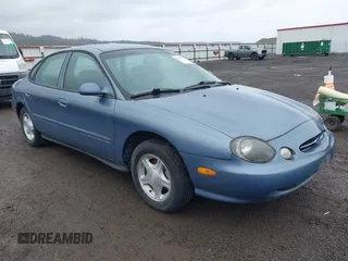 1999 Ford Taurus SE with VIN 1FAFP53U5XG190788, listed as a IAAI auction lot 41880104 with 68,810 mi miles. Bid and sale history available at carsss.com. Image 1.