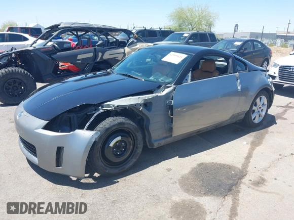 2004 Nissan 350Z Enthusiast z VIN JN1AZ34D74T164233, wystawiony jako IAAI lot #42509421 z przebiegiem 90 780 mil mil oraz . Historia ofert i sprzedaży dostępna na DreamBid. Obrazek 19.