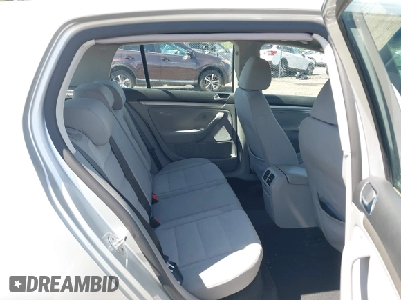 2009 Volkswagen Rabbit S z VIN WVWDA71K49W084907, wystawiony jako IAAI lot #42198880 z przebiegiem 160 293 mil mil oraz . Historia ofert i sprzedaży dostępna na DreamBid. Obrazek 8.