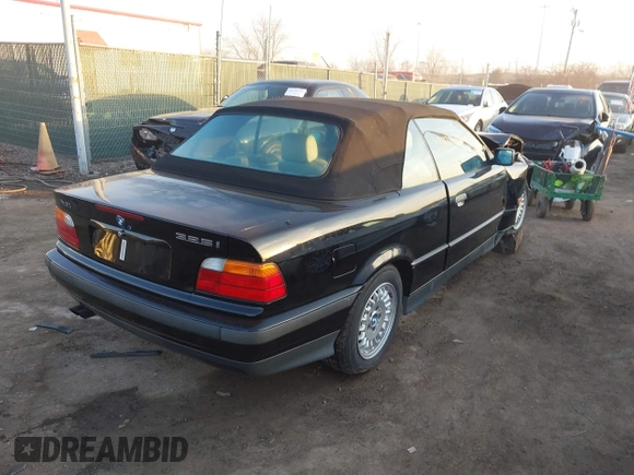 1995 BMW 3 Series 325iC with VIN WBABJ6328SJD38619, listed as a IAAI auction lot 41785146 with 93,742 mi miles. Bid and sale history available at carsss.com. Image 4.