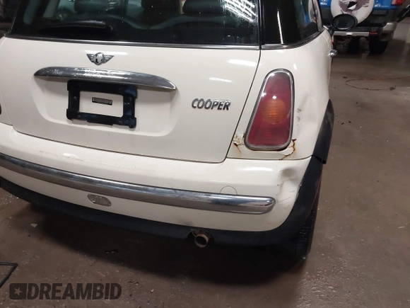 2004 MINI Hardtop with VIN WMWRC33404TC48963, listed as a IAAI auction lot 41661909 with 182,532 mi miles and . Bid and sale history available at DreamBid. Image 6.