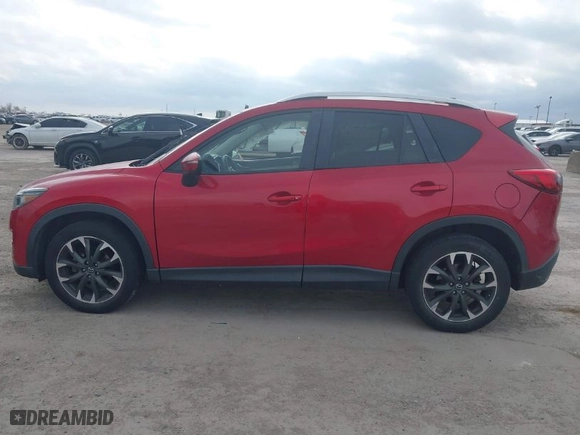 2016 Mazda CX-5 Grand Touring with VIN JM3KE4DYXG0641174, listed as a IAAI auction lot 41182655 with NaN miles. Bid and sale history available at carsss.com. Image 14.