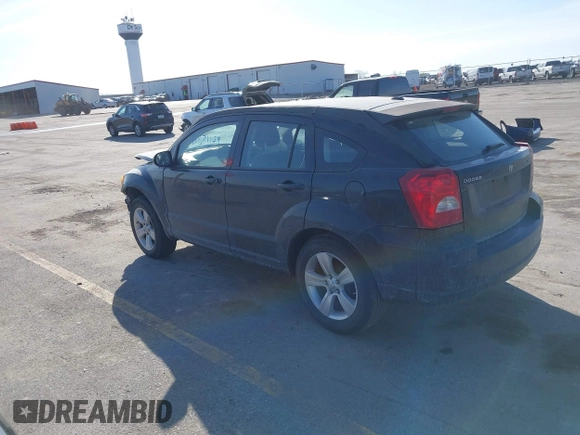 2010 Dodge Caliber SXT with VIN 1B3CB4HA4AD651946, listed as a IAAI auction lot 41771139 with 165,663 mi miles and . Bid and sale history available at DreamBid. Image 3.