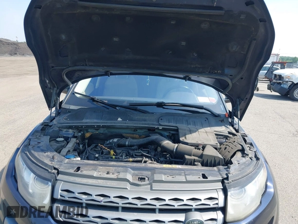 2015 Land Rover Range Rover Evoque Pure z VIN SALVN2BG5FH972645, wystawiony jako IAAI lot #42482661 z przebiegiem 156 726 mil mil oraz . Historia ofert i sprzedaży dostępna na DreamBid. Obrazek 10.