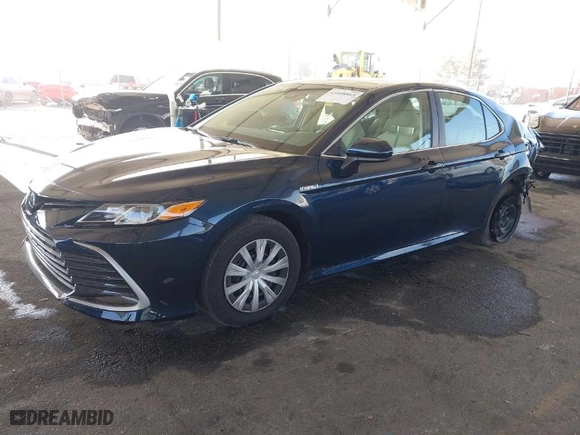 2021 Toyota Camry Hybrid LE with VIN 4T1C31AK5MU566479, listed as a IAAI auction lot 41008865 with 25,703 mi miles. Bid and sale history available at carsss.com. Image 2.