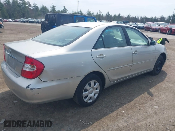 2004 Toyota Camry LE with VIN 4T1BE32K94U928118, listed as a IAAI auction lot 42095320 with 129,266 mi miles and . Bid and sale history available at DreamBid. Image 4.