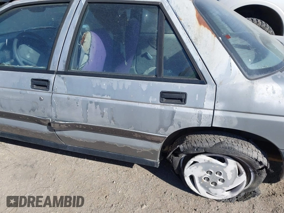 1992 Chevrolet Corsica LT z VIN 1G1LT53T9NY154246, wystawiony jako IAAI lot #41834072 z przebiegiem 87 587 mil mil oraz . Historia ofert i sprzedaży dostępna na DreamBid. Obrazek 6.